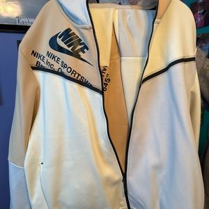 Tan Nike sweat suit.